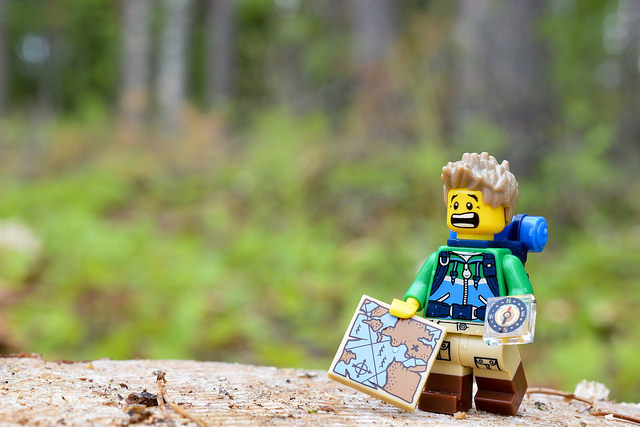 LEGO hiker figure in the woods