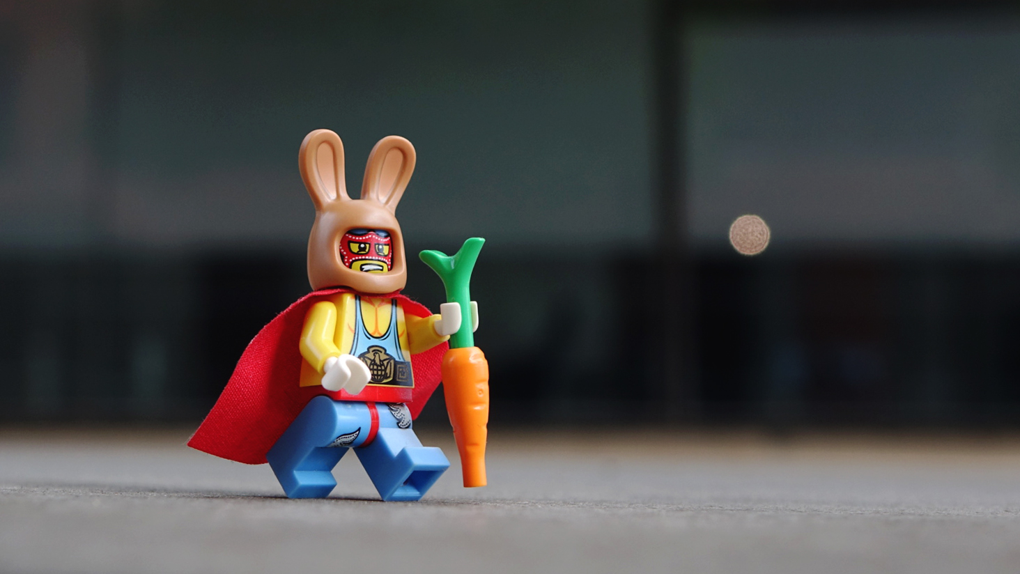 a lego wrestler in a bunny mask running with a carrot
