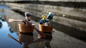 Star Wars: Lego Boba Fett chasing Han Solo in barrels on water