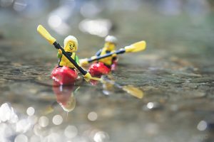 Two LEGO minifigures kayaking photo by Shelly Corbett