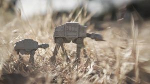two at-at walk through the tall grass taken with a Lensbaby by Shelly Corbett