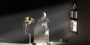 LEGO figure creating a sculpture