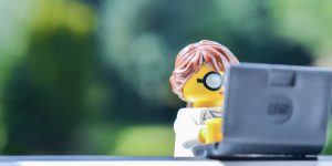 LEGO figure at a laptop
