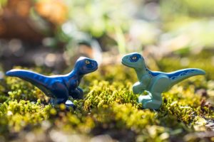 Two tiny LEGO dinosaurs