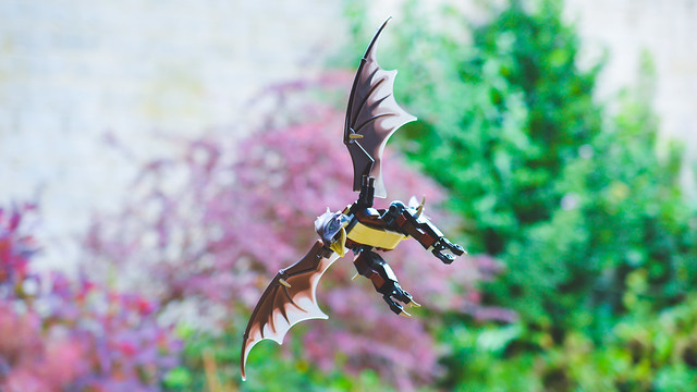 A flying LEGO dragon.