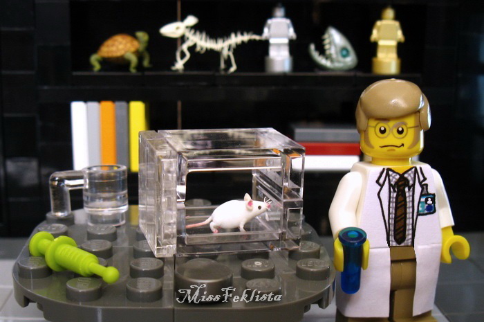 The scientist in his office with a lab mouse