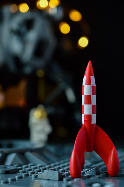 Tintin rocket on the moon, with LEGO Apollo lander in background.