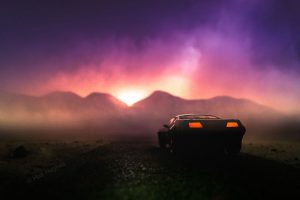 Toy car sunset photography by Hue Hughes