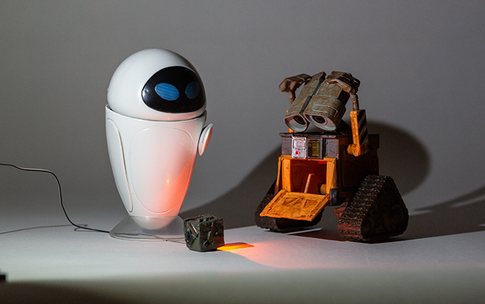 Wall-E and Eve lit with two flood (cool white) Just Plug LEDs from the left and one orange pin LED.