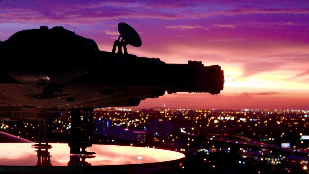 Silhouette of 3.75-inch Star Wars vehicle, the Millenium Falcon on Bespin