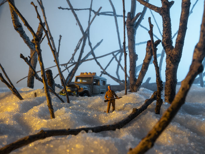 A hunter in the emerging pre-dawn light. HO Scale.