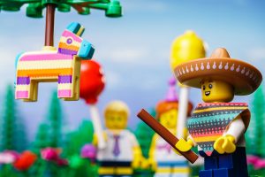LEGO CMF Series 20 Piñata Boy Swinging at a Piñata