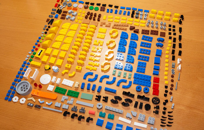 Lego parts laid out in a grid