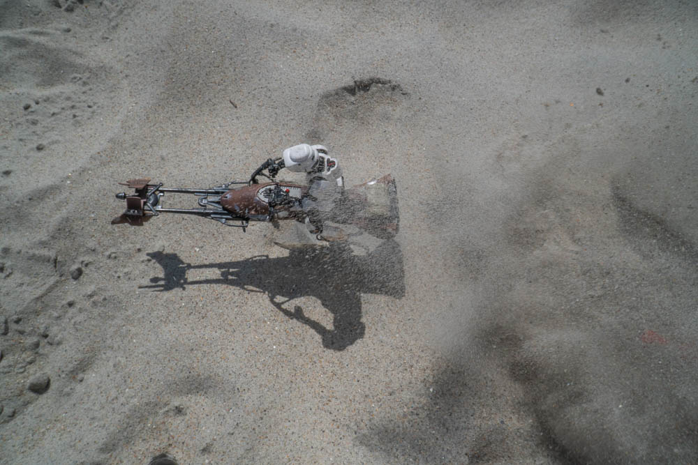 pushing sand from behind


