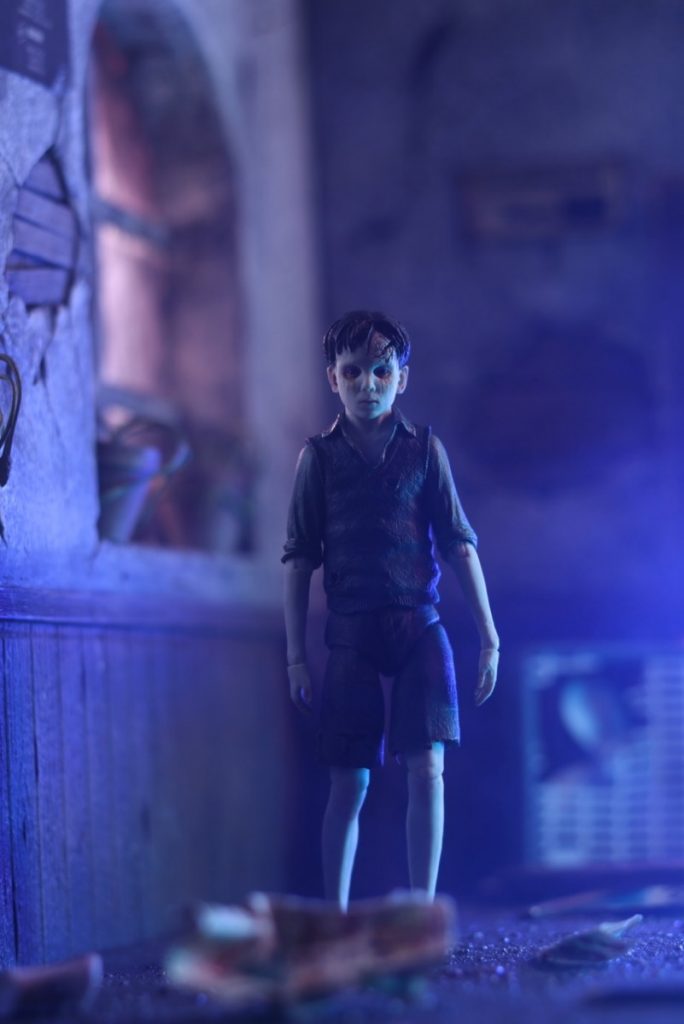 The Devil's Backbone Santi NECA action figure in creepy house by Carlos Mariscal @cmariscal