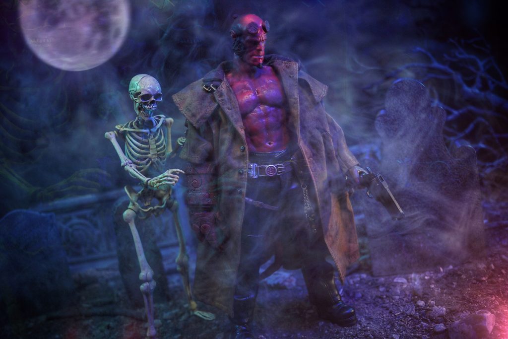 @tromatic_exposure 1:6 scale Hellboy action figure with skeleton in cemetery