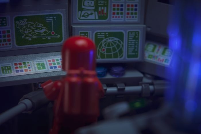 A LEGO built interior of spaceshit with screens and computers