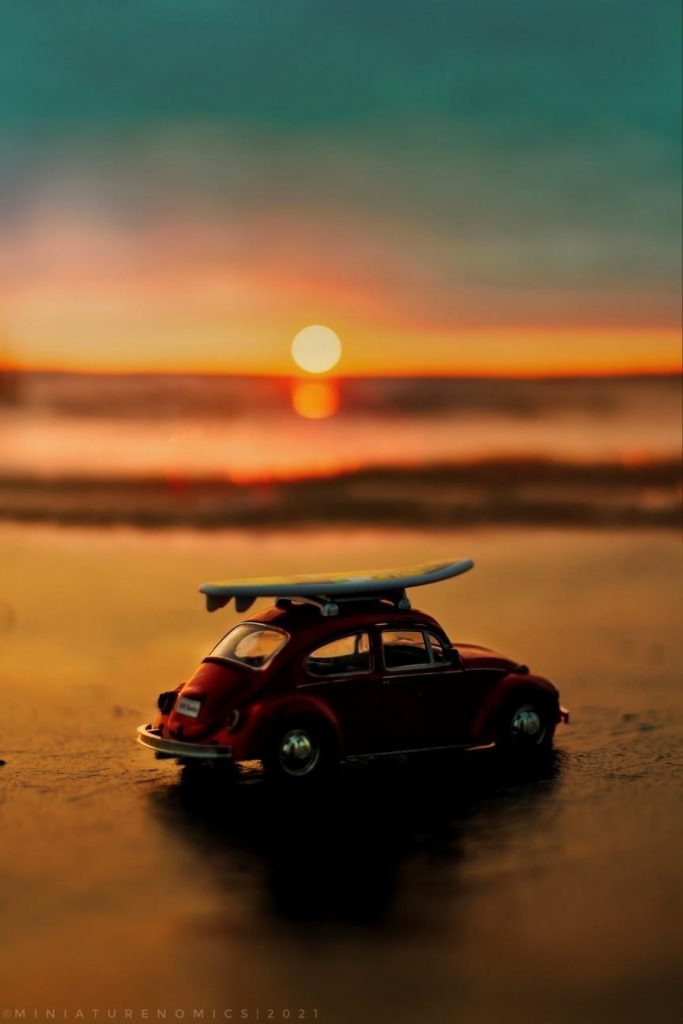 Toy Volkswagen Beetle on the beach