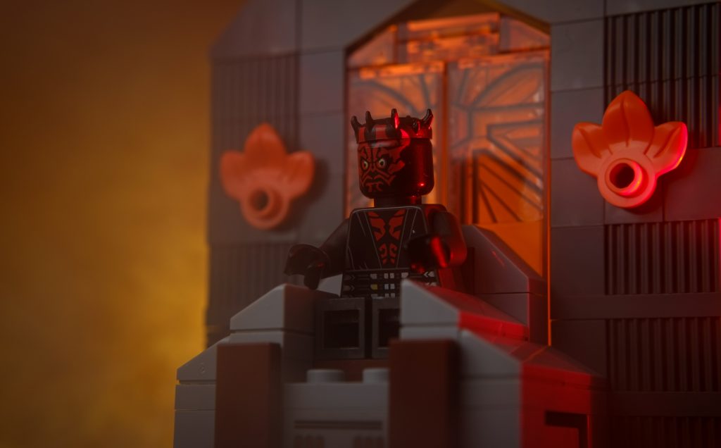 LEGO Darth Maul minifigure sitting on the Mandalore throne