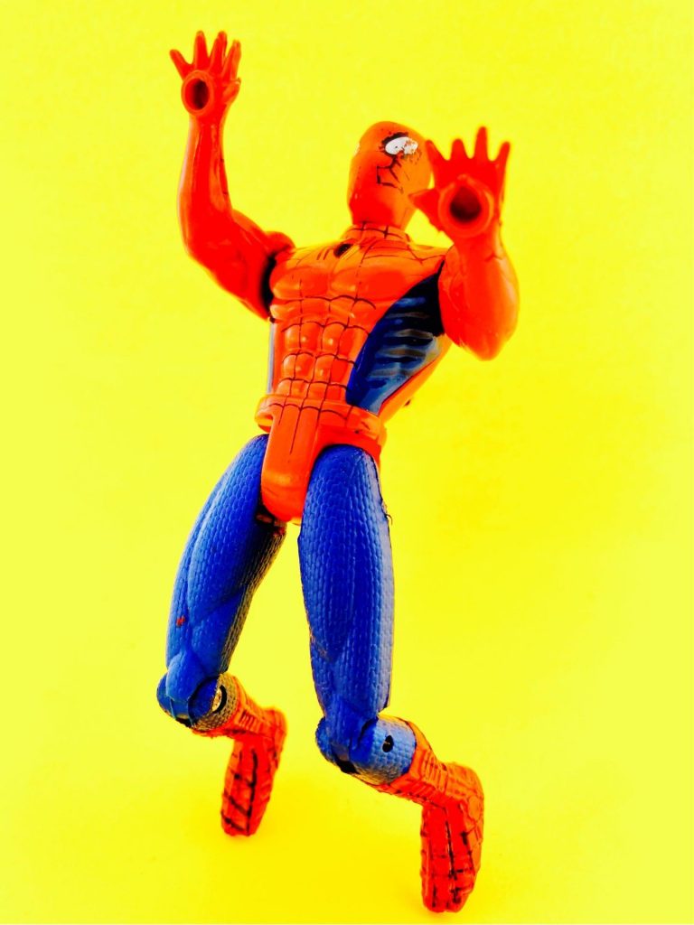 Spider-Man action figure posed like he's dancing 
