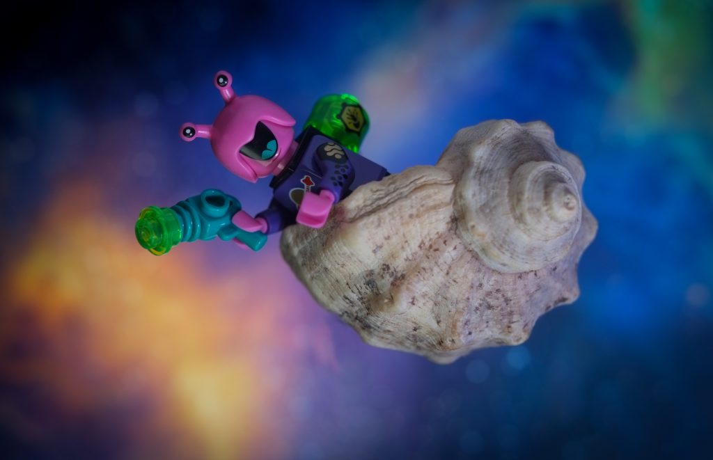 LEGO snail like alien in purple classic space suit