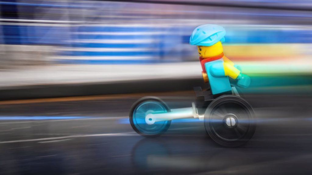 LEGO athlete minifigure on the race type wheelchair.