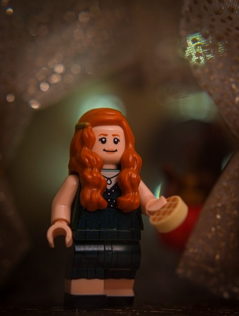 Ginny Weasley LEGO minifigure attenting at Slug Club Christmas party