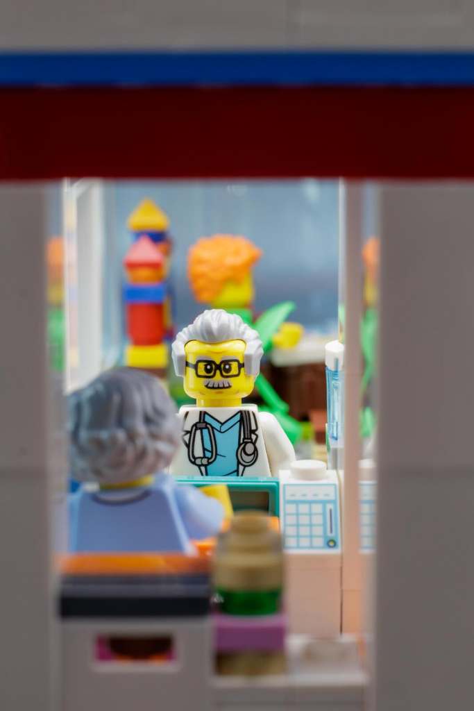LEGO minifigure doctor bying food in hospital's shop