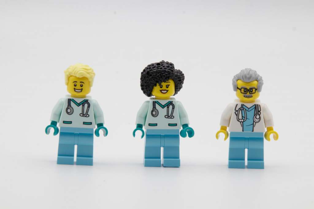 Three LEGO medical staff minifigures
