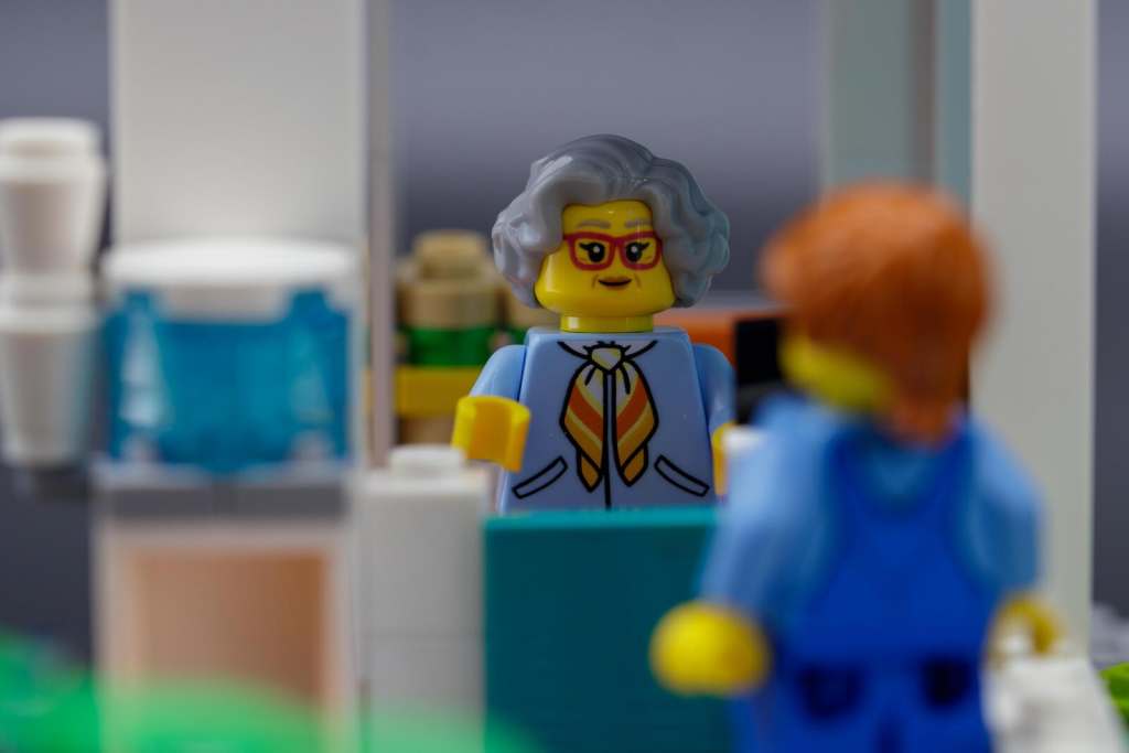 LEGO minifigure saleswoman inside hospital's shop