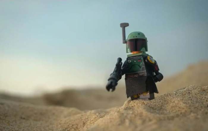 Lego Boba Fett minifigure on the sand dune