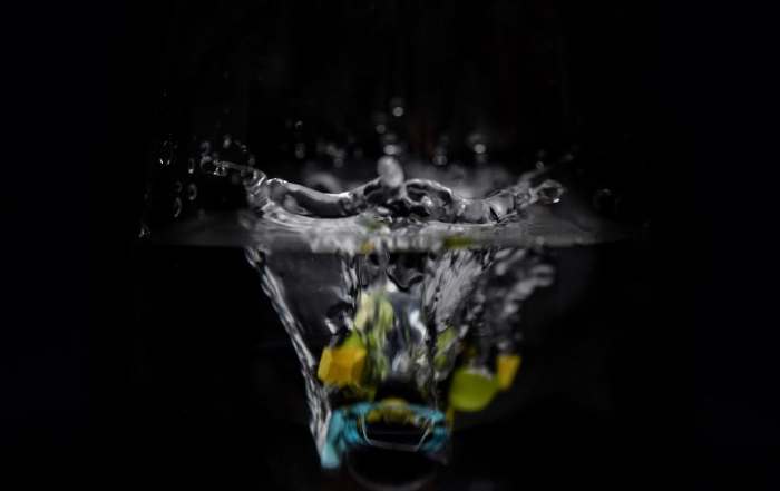 A LEGO diver minifigure submerging into the water author: Tao Liao