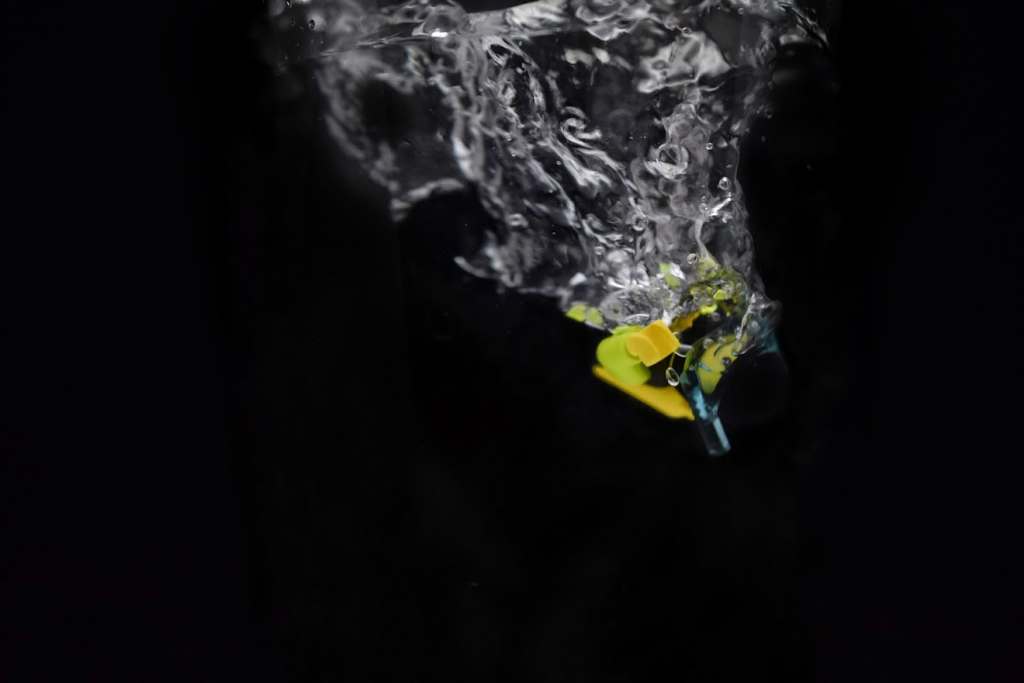 A LEGO diver minifigure submerging into the water

author: Tao Liao