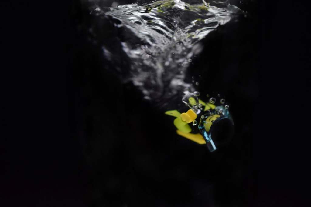 A LEGO diver minifigure submerging into the water

author: Tao Liao