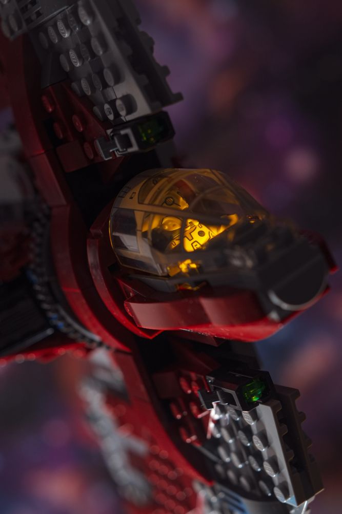 A close-up on the cockpit of LEGO 75362 set - Jedi T-6 shuttle with Huyang minifigure inside.