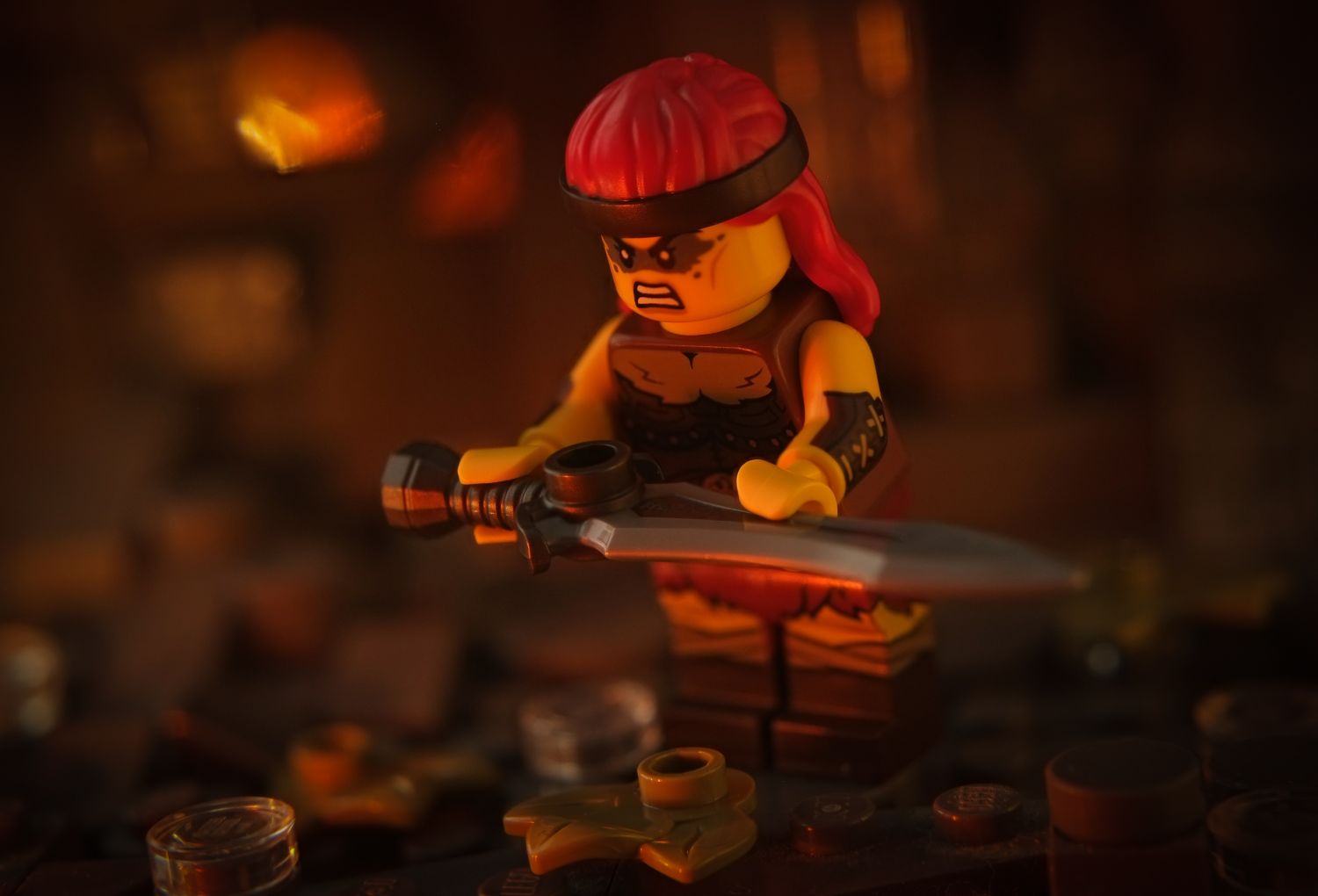 A LEGO barbarian minifigure holding a sword in He-Man I have the power way.