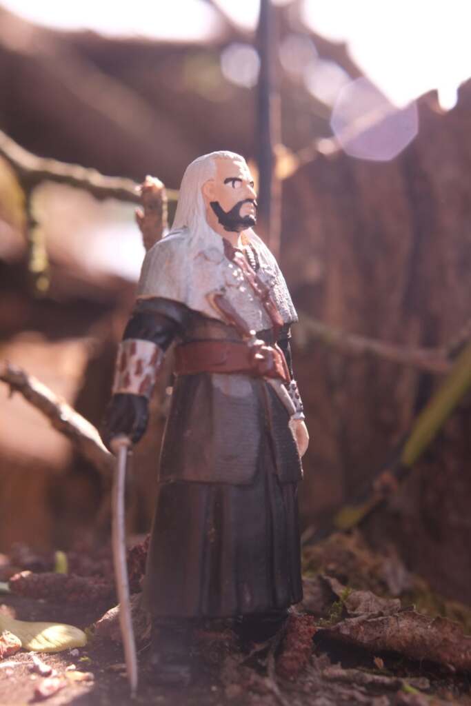 A portrait of bootleg Witcher figure, made in Poland and based on Polish The Witcher series.