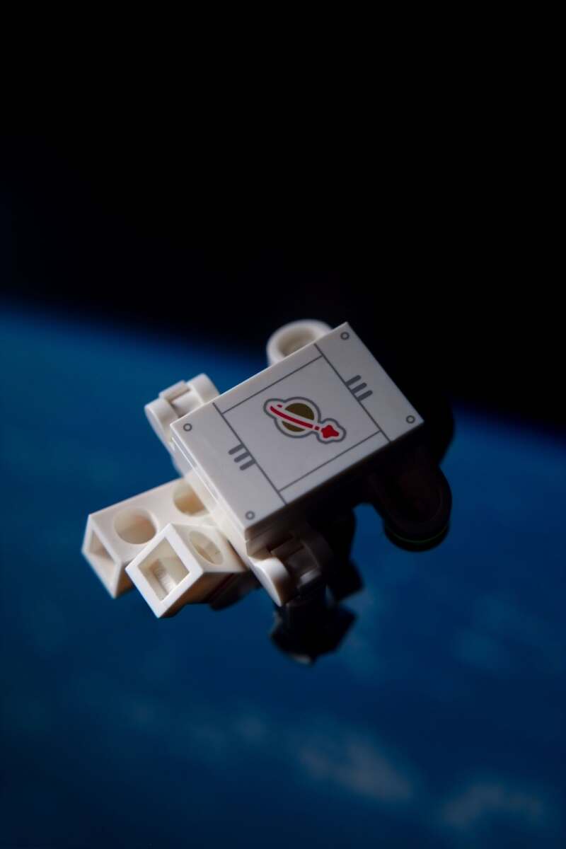 LEGO CMF 26 series spacewalking astronaut minifigure floating in space