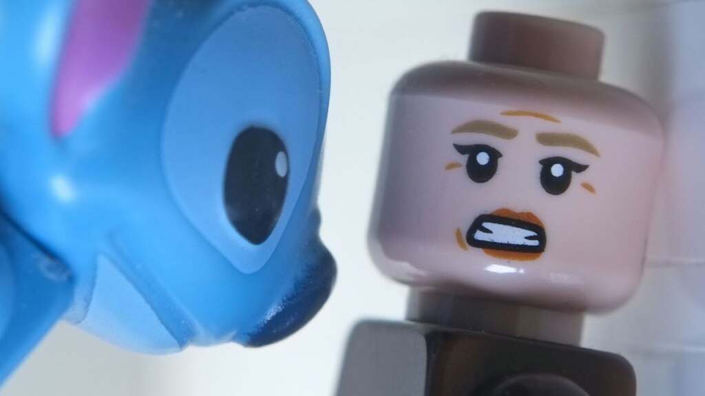 LEGO rendition of iconic close up scene from Alien 3 with Ellen Ripley and Stitch instead of xenomorph