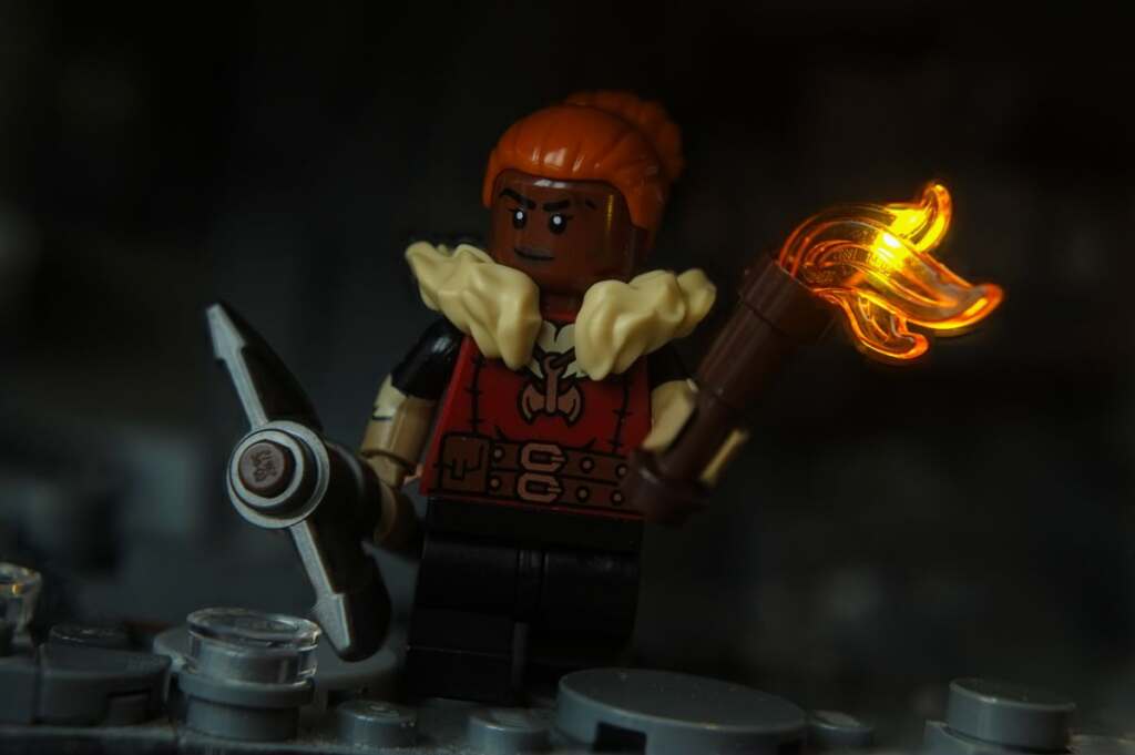 LEGO female dwarf barbarian minifigure with axe and torch