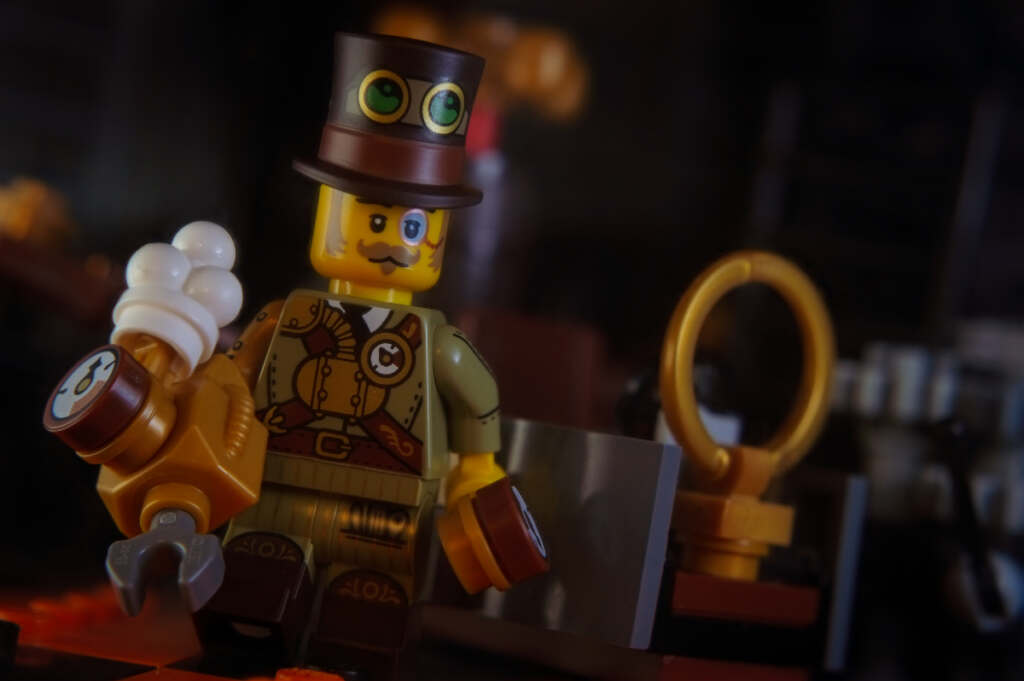 Steampunk Inventor minifigure walsk through a brick-built laboratory-like environment.